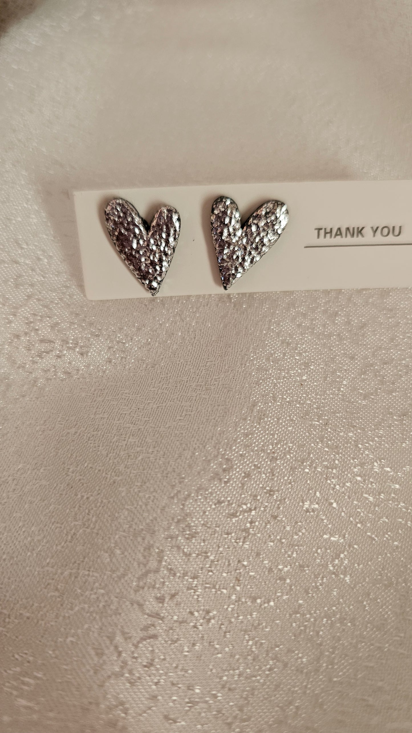Silver heart studs