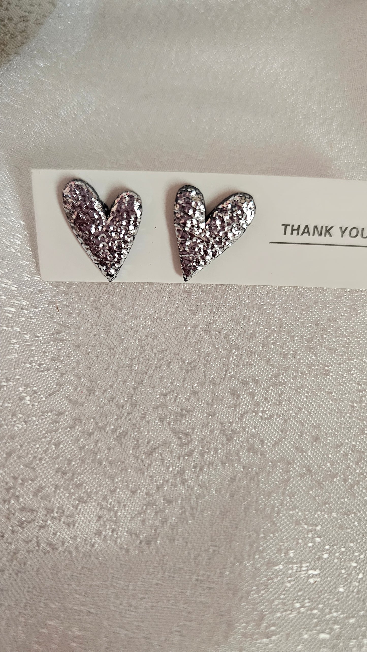 Silver heart studs