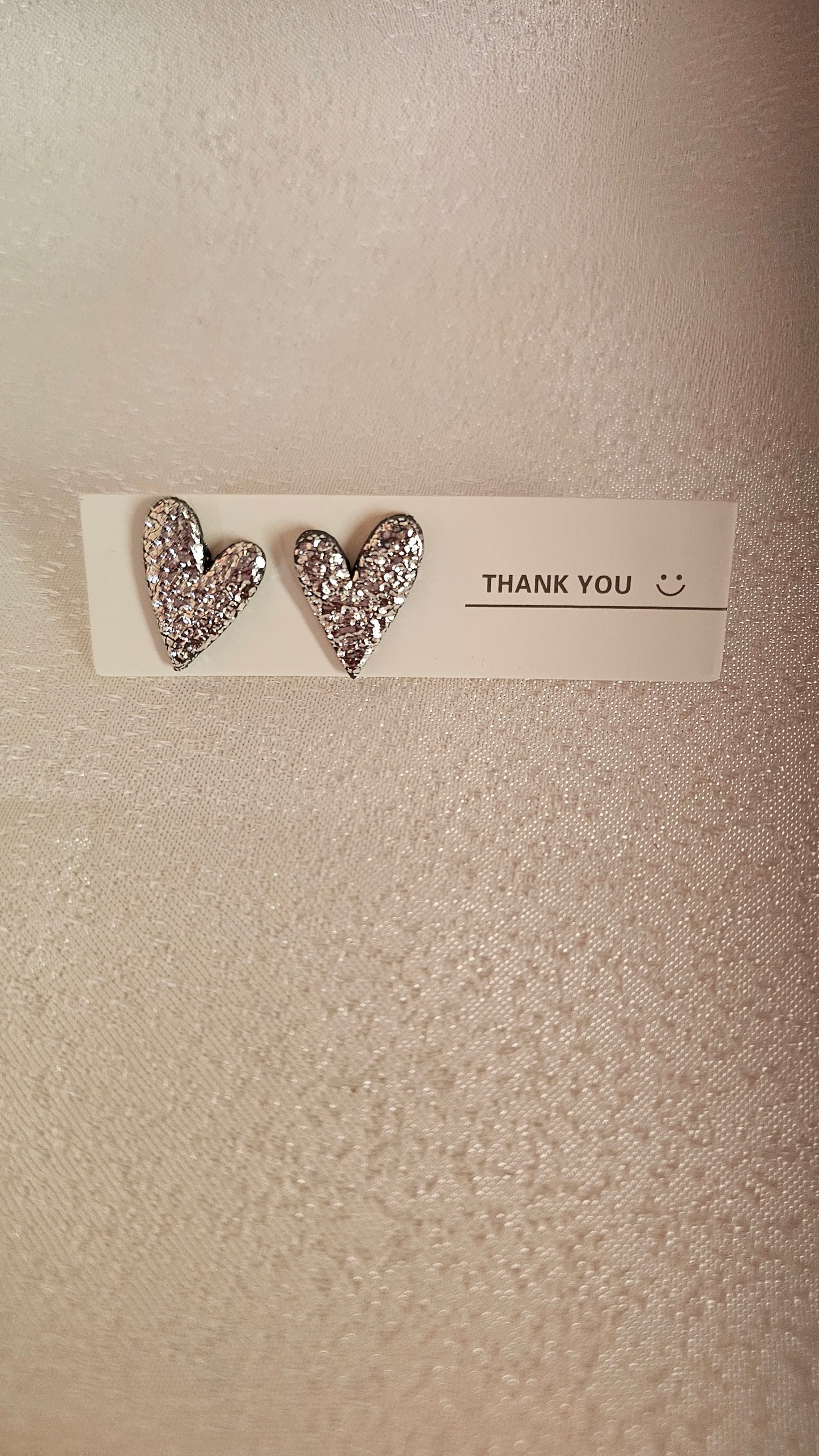 Silver heart studs